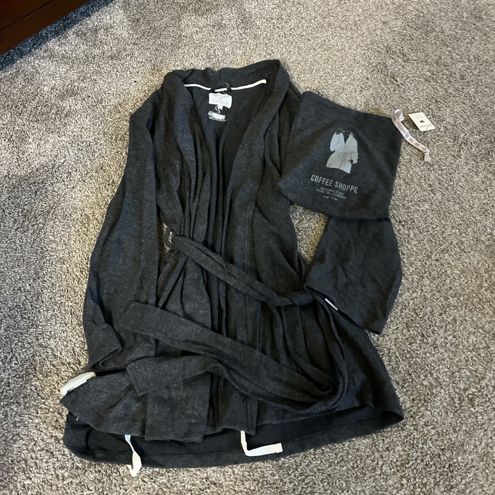 bath robe 
never worn new with tags and travel bag
